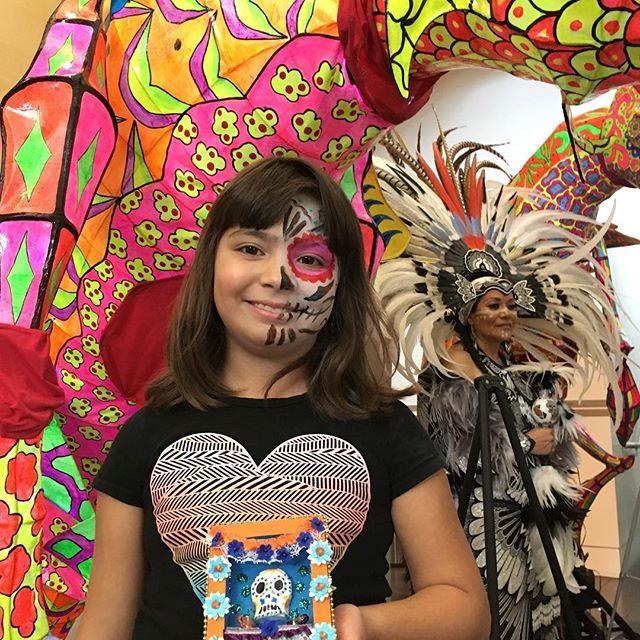Youth attendee at the Dia de los Muertos festival at Tacoma Art Museum.