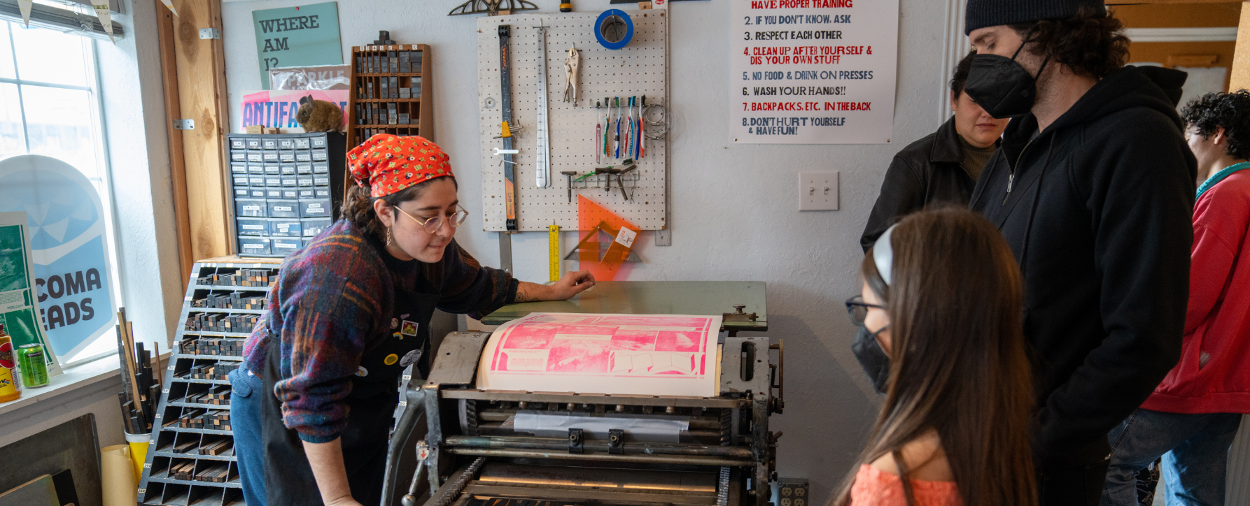 Line Break Press/Write 253 demonstrates a printing press.