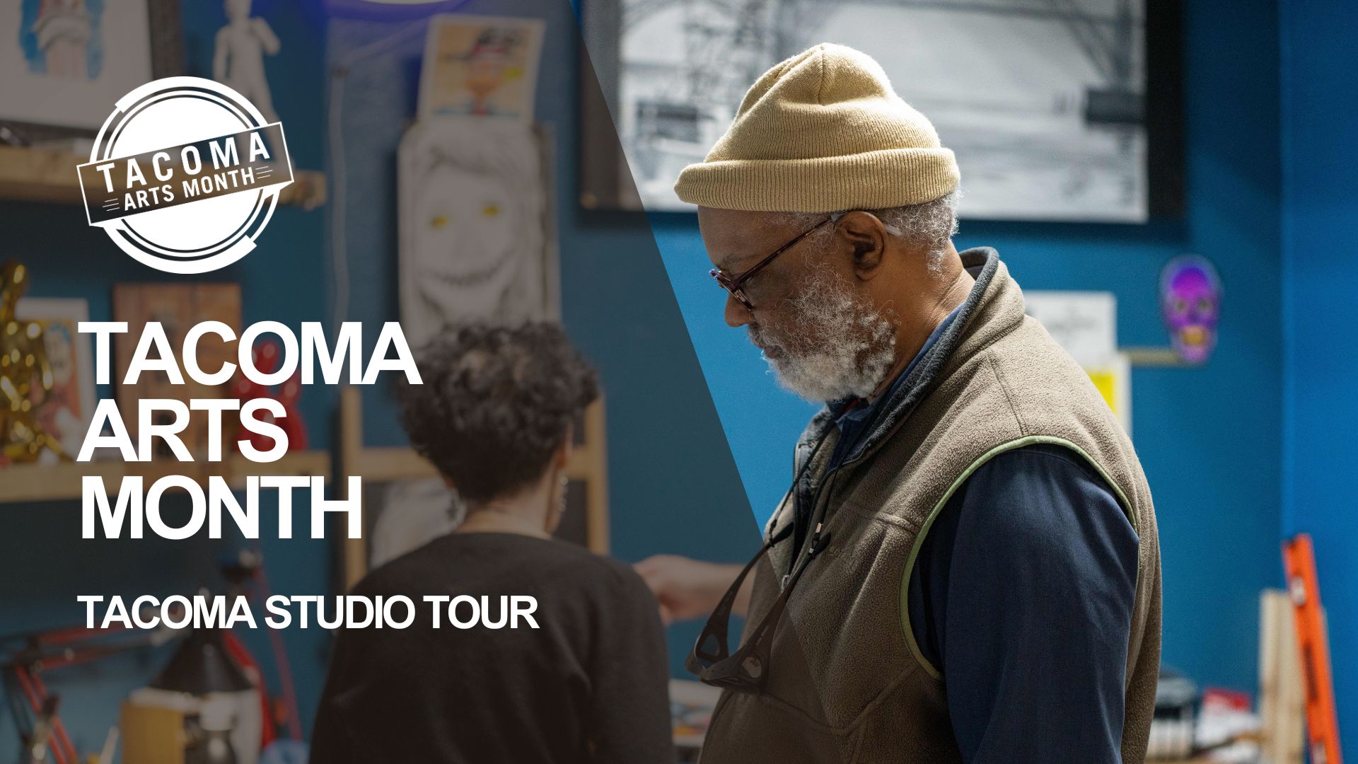 Two participants enjoy looking at art as part of the Tacoma Studio Tour. 