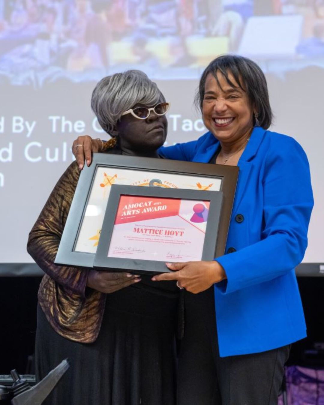 As part of the Tacoma City Council proclamation, the AMOCAT Arts Awards were announced and shared with the community resulting in an emotional and tearful acceptance. 