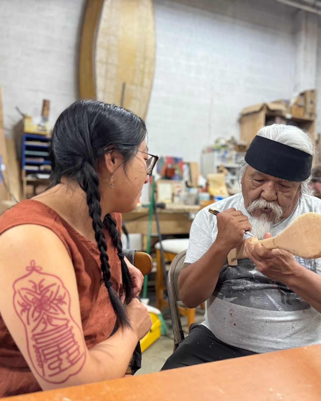 A mentor provides a wood carving demonstration as part of the Tahoma Indian Center's Carving as Medicine program. You can learn about this event and more in the Tacoma Arts Month Events Calendar.