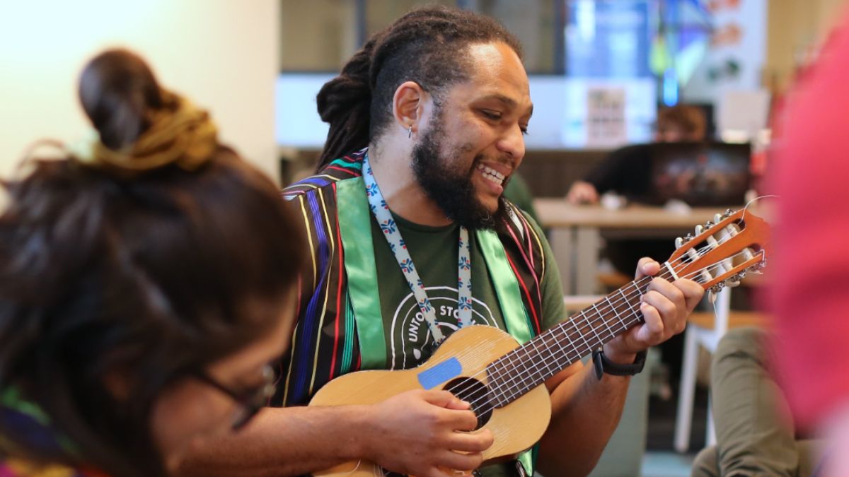 Joe from the Tacoma Public Library plays at Kaleidoscope, the Tacoma Arts Month Opening Celebration